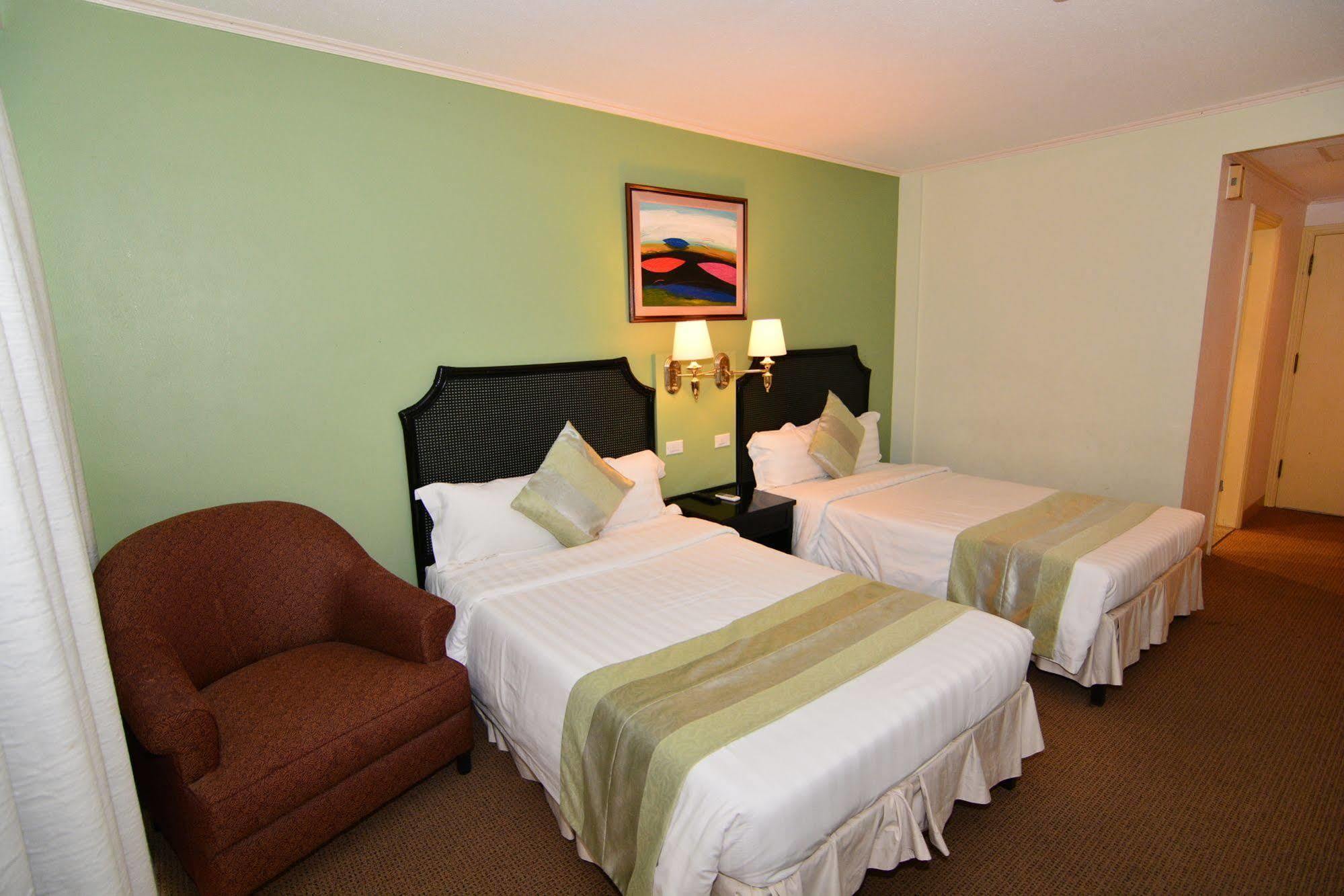 Century Hotel Garapan Buitenkant foto