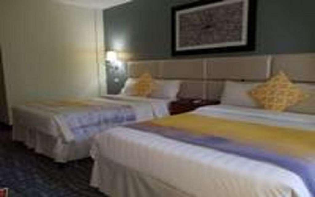 Century Hotel Garapan Kamer foto